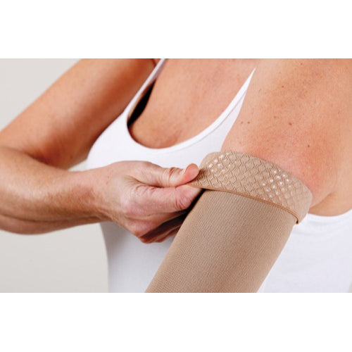 Jobst 20-30 mmHg Compression Armsleeve, Beige, Small, with Silicone Band, provides firm support for lymphedema and circulation relief. Moovkart