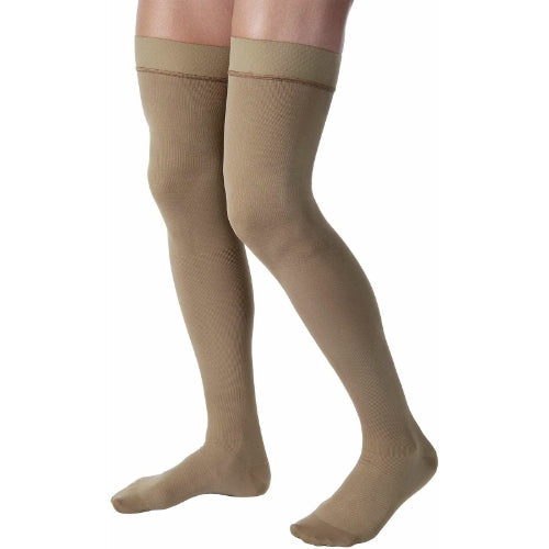 Jobst for Men thigh-high compression stockings in khaki, medium size.