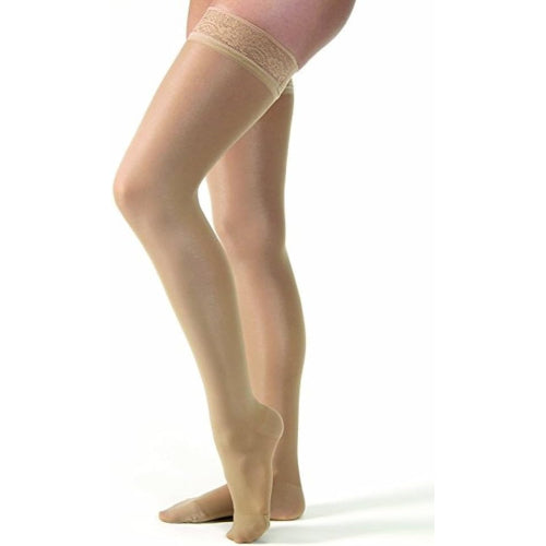 Jobst Ultrasheer sheer thigh-high compression stockings in beige, small size.