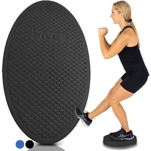 Oval black balance pad with textured surface